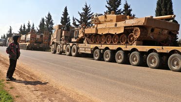 A convoy of Turkish military vehicles is pictured near the town of Hazano in the rebel-held northern countryside of Syria's Idlib province on March 3, 2020. A Turkish fighter jet downed a Syrian regime warplane over northwestern Syria and the pilot was killed, a war monitor said, in the third such downing in three days. Regime artillery fire, meanwhile, killed nine civilians in the main city in the embattled opposition bastion of Idlib. Regime forces have since December been battling to retake the jihadist-dominated stronghold, where Ankara backs some rebel groups.
