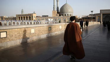 An Iranian cleric walks in front of the Shrine of Fatima Masumeh in Qom, Iran February 09, 2020. Nazanin Tabatabaee/WANA (West Asia News Agency) via REUTERS ATTENTION EDITORS - THIS IMAGE HAS BEEN SUPPLIED BY A THIRD PARTY