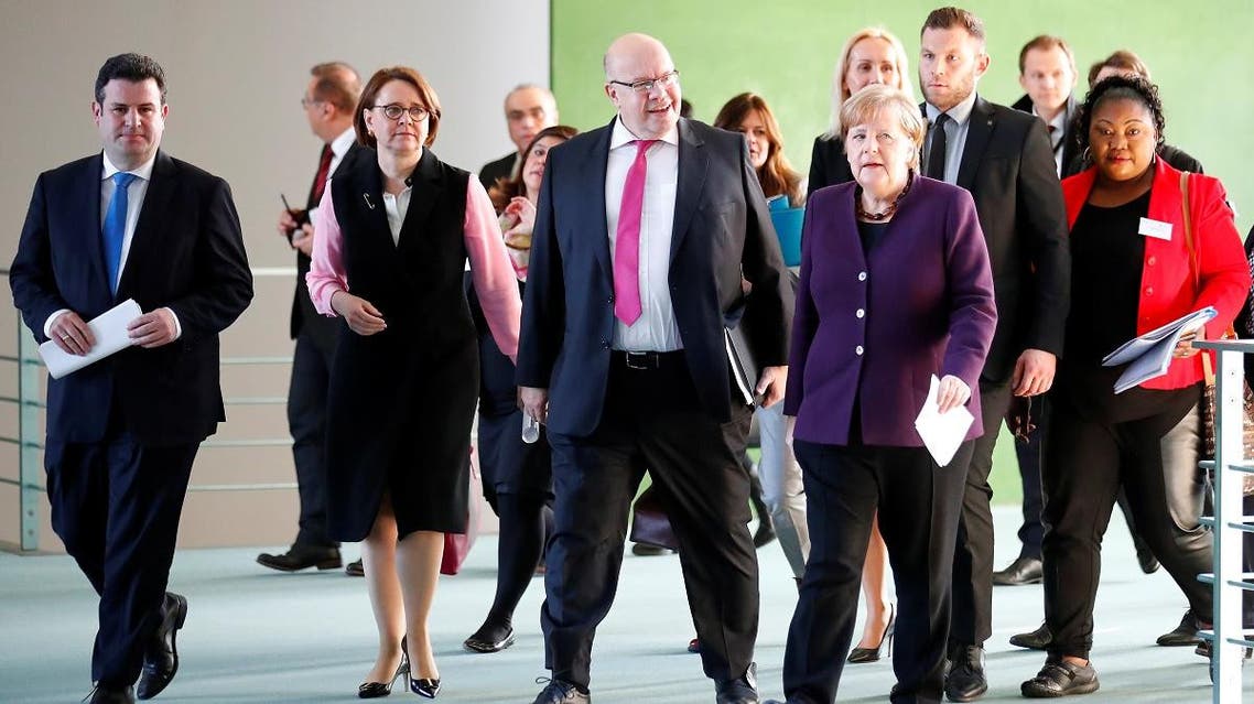 German Chancellor Angela Merkel arrives for a news conference after a migration summit at the Chancellery in Berlin, Germany, March 2, 2020. REUTERS