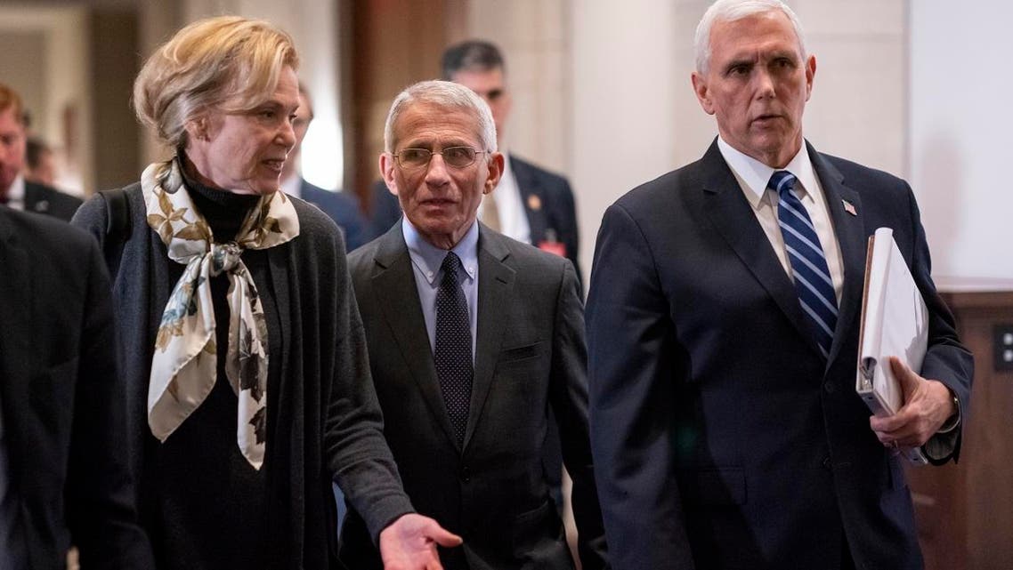 White House coronavirus response coordinator Dr. Deborah Birx (left), and Dr. Anthony Fauci (center), director of the National Institute of Allergy and Infectious Diseases, walk with Vice President Mike Pence (right), as they walk on Capitol Hill in Washington, on March 4, 2020. (AP)
