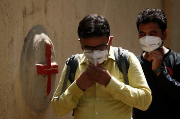Men enter a hospital where a special ward has been set up for the coronavirus disease in Mumbai. (Reuters)