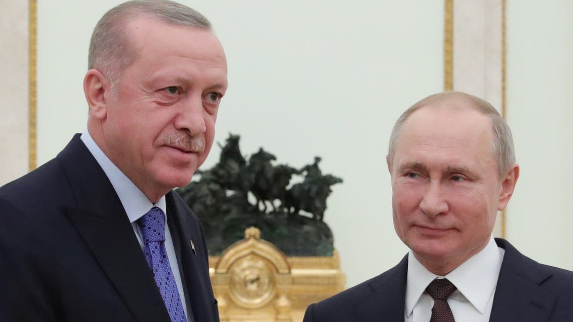 Russian President Vladimir Putin and Turkish President Tayyip Erdogan pose for a photo during a meeting in Moscow, Russia March 5, 2020. Sputnik/Mikhail Klimentyev/Kremlin via REUTERS ATTENTION EDITORS - THIS IMAGE WAS PROVIDED BY A THIRD PARTY.