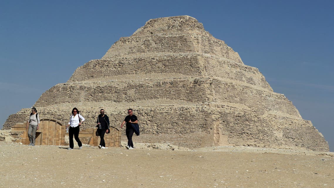 Tourists take pictures at the archaeological site of the standing step pyramid of Saqqara after its renovation, south of Cairo, Egypt March 5, 2020. REUTERS/Mohamed Abd El Ghany