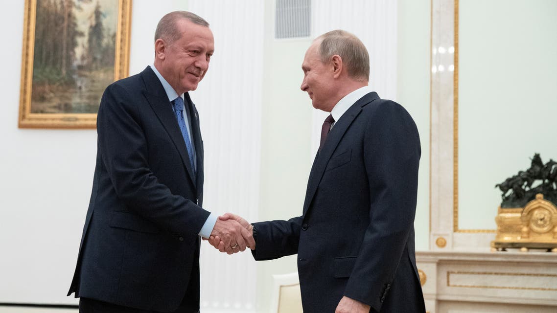 Russian President Vladimir Putin and Turkish President Tayyip Erdogan pose for a photo during a meeting in Moscow, Russia March 5, 2020. Sputnik/Mikhail Klimentyev/Kremlin via REUTERS ATTENTION EDITORS - THIS IMAGE WAS PROVIDED BY A THIRD PARTY.