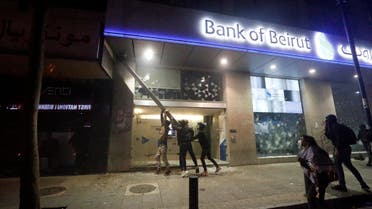 Protestors attack Bank of Beirut building during protests over economic hardship and lack of new government in Beirut, Lebanon, January 14, 2020. (Reuters)