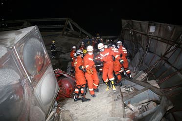 Rescue workers move casualty on the site where a hotel being used for the coronavirus quarantine collapsed, as the country is hit by the novel coronavirus, in the southeast Chinese port city of Quanzhou, Fujian province, China March 7, 2020. Picture taken March 7, 2020. (Reuters)