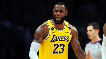 Los Angeles Lakers forward LeBron James (23) reacts against the Milwaukee Bucks during the second half at Staples Center. (Gary A. Vasquez/USA TODAY Sports)