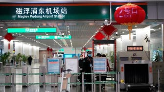 Shanghai tightens airport screening as imported coronavirus cases in China jump