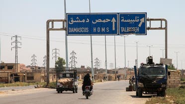 A picture taken on August 3, 2017 shows vehicles driving along the highway between the capital Damascus and the central city of Homs. (File photo: AFP)              