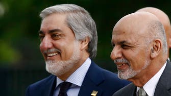 Ending long feud, Afghan president Ghani and rival Abdullah sign power-sharing deal
