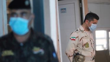 A member of Iranian Border Guards wears a protective face mask, following an outbreak of the new coronavirus, inside the Shalamcha Border Crossing, after Iraq shut a border crossing to travellers between Iraq and Iran, Iraq March 8, 2020. REUTERS/Essam al-Sudani