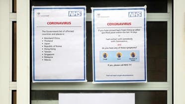 Signs relating to Coronavirus are seen on the front entrance to Parson's Green Medical Centre in London, Britain, March 5, 2020. (Reuters)