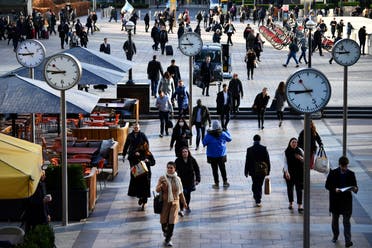 Commuters walk through Canary Wharf, as the number of coronavirus cases grow around the world and as European stocks plunge into bear market territory, in London, Britain March 9, 2020. (Reuters)