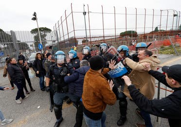 Relatives of inmates clash with police outside of Rebibbia Prison during a prisoners' revolt, after family visits were suspended due to fears over coronavirus contagion, in Rome, Italy March 9, 2020. (Reuters)