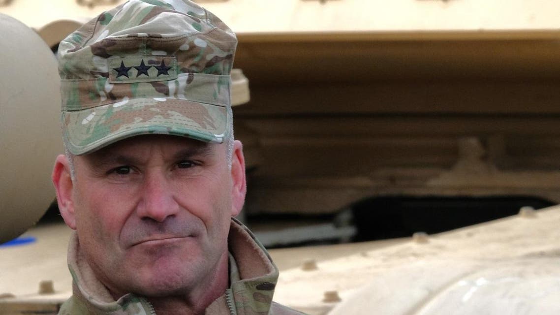 US army's Lieutenant General Christopher G. Cavoli, who commands the United States Army Europe (USAREUR), attends the unloading operation of US military equipment of the 2nd Brigade Combat Team, 3rd Infantry Division, ahead of the Defender 2020 international military exercises at the Port of Bremerhaven on February 21, 2020. (AFP)