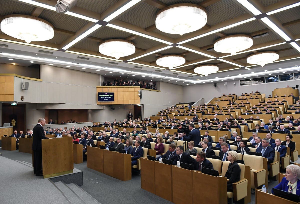 Russian President Vladimir Putin addresses lawmakers debating on the second reading of the constitutional reform bill during a session of the State Duma, Russia's lower house of parliament, in Moscow on March 10, 2020. (AFP)