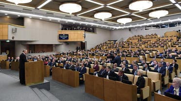 Russian President Vladimir Putin addresses lawmakers debating on the second reading of the constitutional reform bill during a session of the State Duma, Russia's lower house of parliament, in Moscow on March 10, 2020. (AFP)