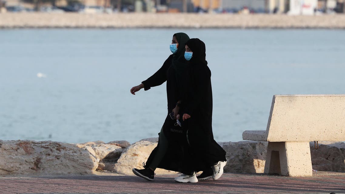 Women wear protective face masks, as they walk, after Saudi Arabia imposed a temporary lockdown on the province of Qatif, following the spread of coronavirus, in Qatif, Saudi Arabia, March 10, 2020. (Reuters)
