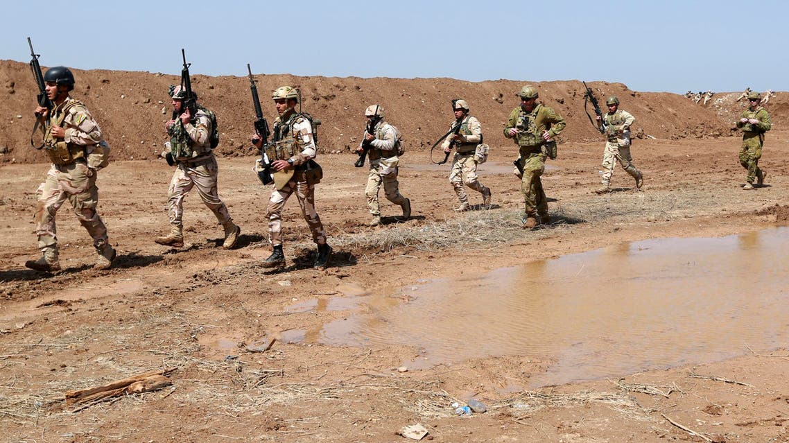 Coalition forces train Iraqi soldiers improve their skills during a military exercise at Camp Taji, north of Baghdad, Iraq, March 20, 2017. (File photo: AP)
