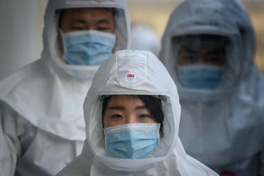 Medical workers wearing protective clothing against COVID-19 in Daegu, South Korea. (Photo: AFP)