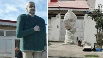 Online users ridicule Iran plastic cover-up of Soleimani statue in northern Iran