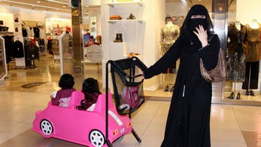 A Saudi woman shops at a mall with her children in Jeddah, Saudi Arabia. (File photo: Reuters)