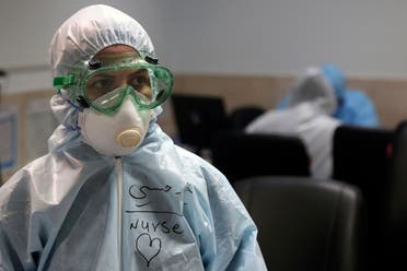 A nurse wears protective gear in a ward dedicated for people infected with the new coronavirus, at a hospital in Tehran on March 8, 2020. (AP)