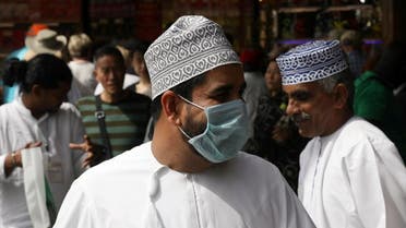 A man wears a protective face mask, following the outbreak of the new coronavirus, as he walks at the Grand Souq in old Dubai, United Arab Emirates, March 2, 2020. (Reuters)