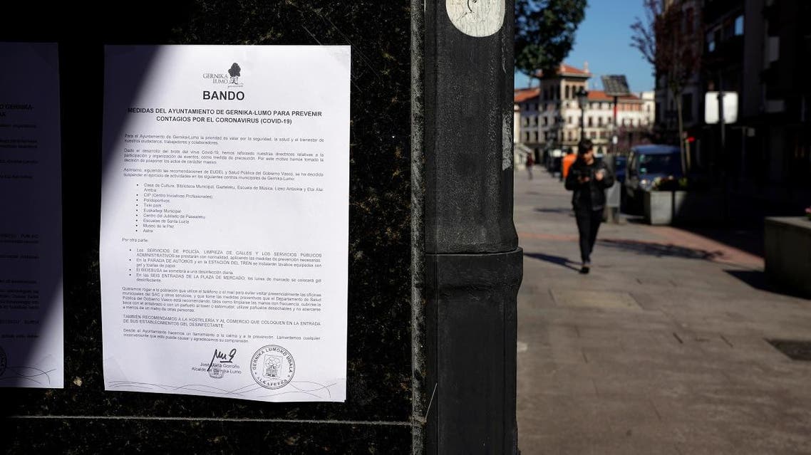 A poster giving disease prevention advice is seen during partial lockdown as part of a 15-day state of emergency to combat the coronavirus outbreak in the Basque town of Guernica. (Reuters)