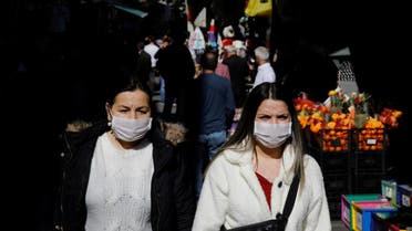 People wear protective face masks due to coronavirus concerns in Istanbul, Turkey March 13, 2020. (Reuters)