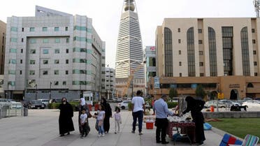Visitors walk near the King Fahd Library, following an outbreak of coronavirus, in Riyadh, Saudi Arabia. (Reuters)