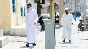 A man wears a protective face mask, as he walks, after Saudi Arabia imposed a temporary lockdown on the province of Qatif, following the spread of coronavirus, in Qatif, Saudi Arabia, March 10, 2020. (Reuters)