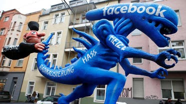 A figure depicting hate speech at Facebook is pictured during the "Rosenmontag" (Rose Monday) parade in Duesseldorf, Germany February 24, 2020. (Reuters)