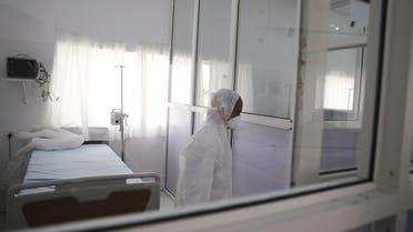 A health worker walks inside a newly erected coronavirus quarantine center in Sanaa, Yemen, March 2, 2020. (Reuters)