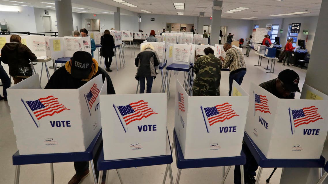People participate in early voting, Friday, March 13, 2020, in Cleveland. (AP)