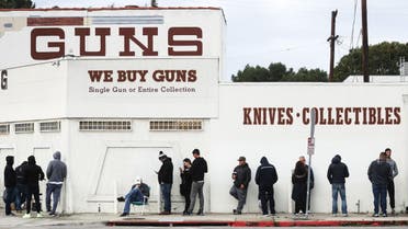  People line up outside a gun store in California as fears over a food shortage caused by the coronavirus outreak spread. (Twitter)