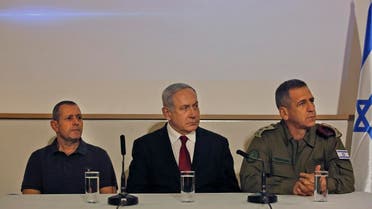 Israeli Prime Minister Benjamin Netanyahu (C) Army Chief of Staff, Lieutenant General Aviv Kochavi, and Shin Bet director Nadav Argaman (L) address the media. (File photo: AFP)