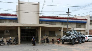 A Paraguayan armoured tank remains outside Tacumbu prison in Asuncion, on January 21, 2020. (AFP)