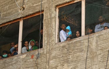 Syrian refugees in a building under construction they have been using as a shelter in the city of Sidon in southern Lebanon, on March 17, 2020. (File photo: AP)