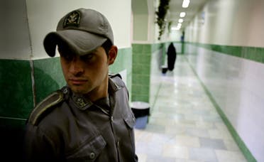 A prison guard stands along a corridor in Tehran's Evin prison on June 13, 2006. (AP)