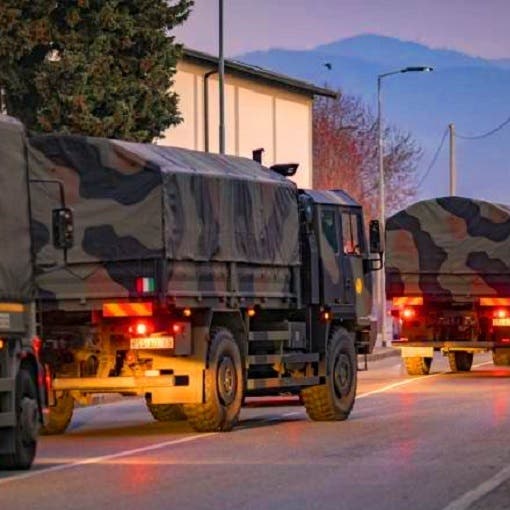 شاهد الجيش الإيطالي ينقل بالشاحنات جثث الضحايا لحرقها