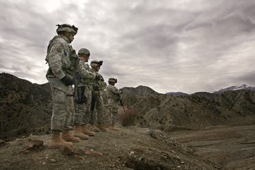 In this file photo, US soldiers look out over the landscape around Firebase Wilderness in Gardez province in Afghanistan.
