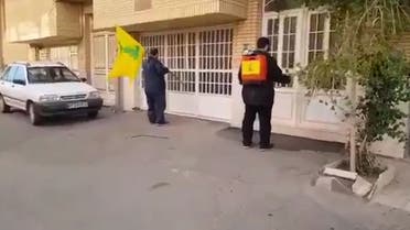 Hezbollah members disinfecting Qom streets in Iran