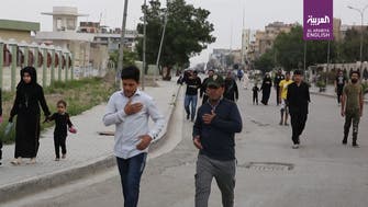 Thousands of Iraqi Shias defy coronavirus curfews to commemorate imam