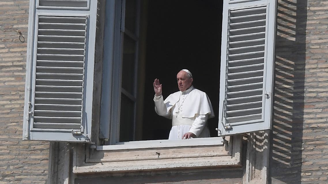 Pope Francis is seen delivering his weekly Angelus prayer at Saint Peter's Square in the Vatican City as Italians stay home as part of a lockdown against the spread of coronavirus disease (COVID-19) in Rome, Italy March 22, 2020. REUTERS/Alberto Lingria