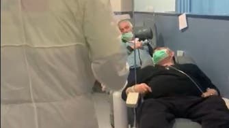 فيديو.. تكدس صادم للمصابين بكورونا بممرات مستشفى إسباني