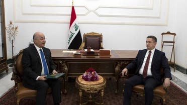 Iraq President Barham Salih, left, with Prime Minister-designate Adnan Al Zurufi at the commissioning ceremony on March 17, 2020. Image @IraqiPresidency via Twitter)