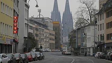 Gereonstrasse is deserted in front of the Cologne Cathedral in Cologne, Germany, Friday, March 20, 2020. (AP)