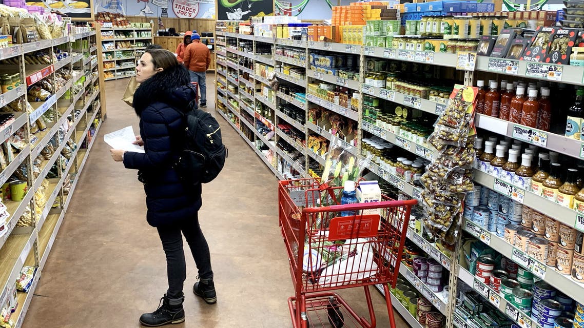 A woman shops at Trader Joe's at on March 23, 2020 in Cambridge, Massachusetts. (AFP)