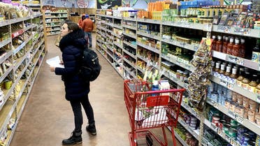  A woman shops at Trader Joe's at on March 23, 2020 in Cambridge, Massachusetts. (AFP)